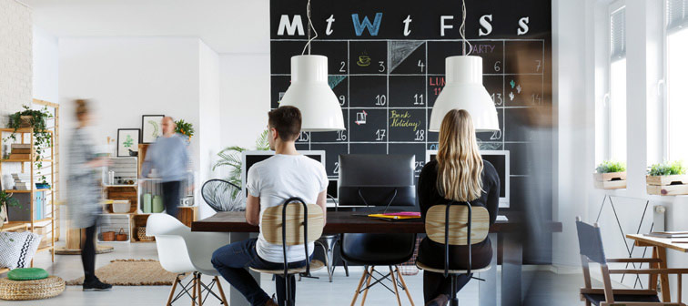 People in modern coworking space